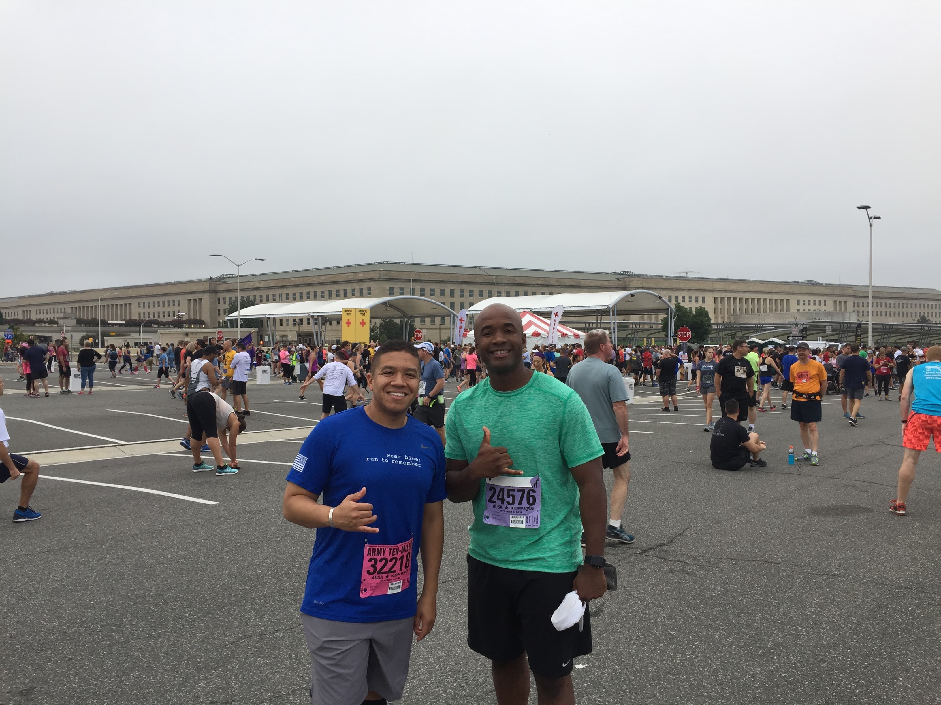 Walter at a marathon finish line with a friend